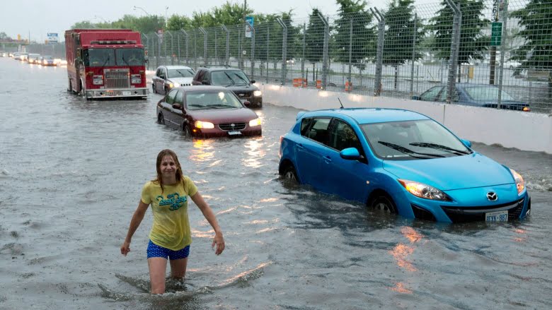 Toronto was hard-hit by flooding in July 2013. A poll commissioned by Public Safety Canada suggests many homeowners expect Ottawa will compensate them in the event of future flood disasters — but one expert says that may not be the case. (Frank Gunn/Canadian Press)